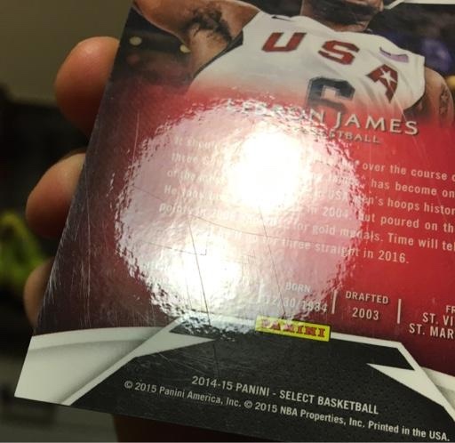 Many use a special light to catch scratches on cards (Blowout Forums)